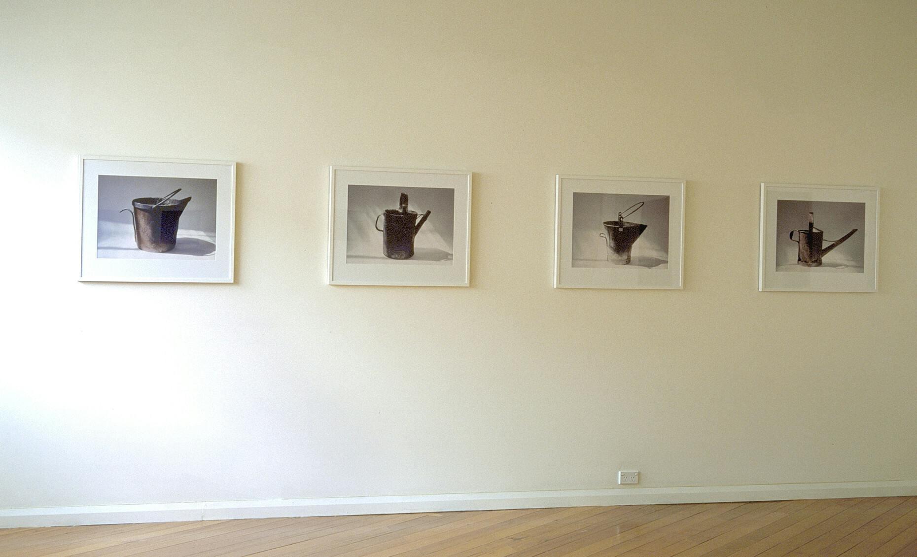 Installation view of Used-up Tool (pails and watering cans) series