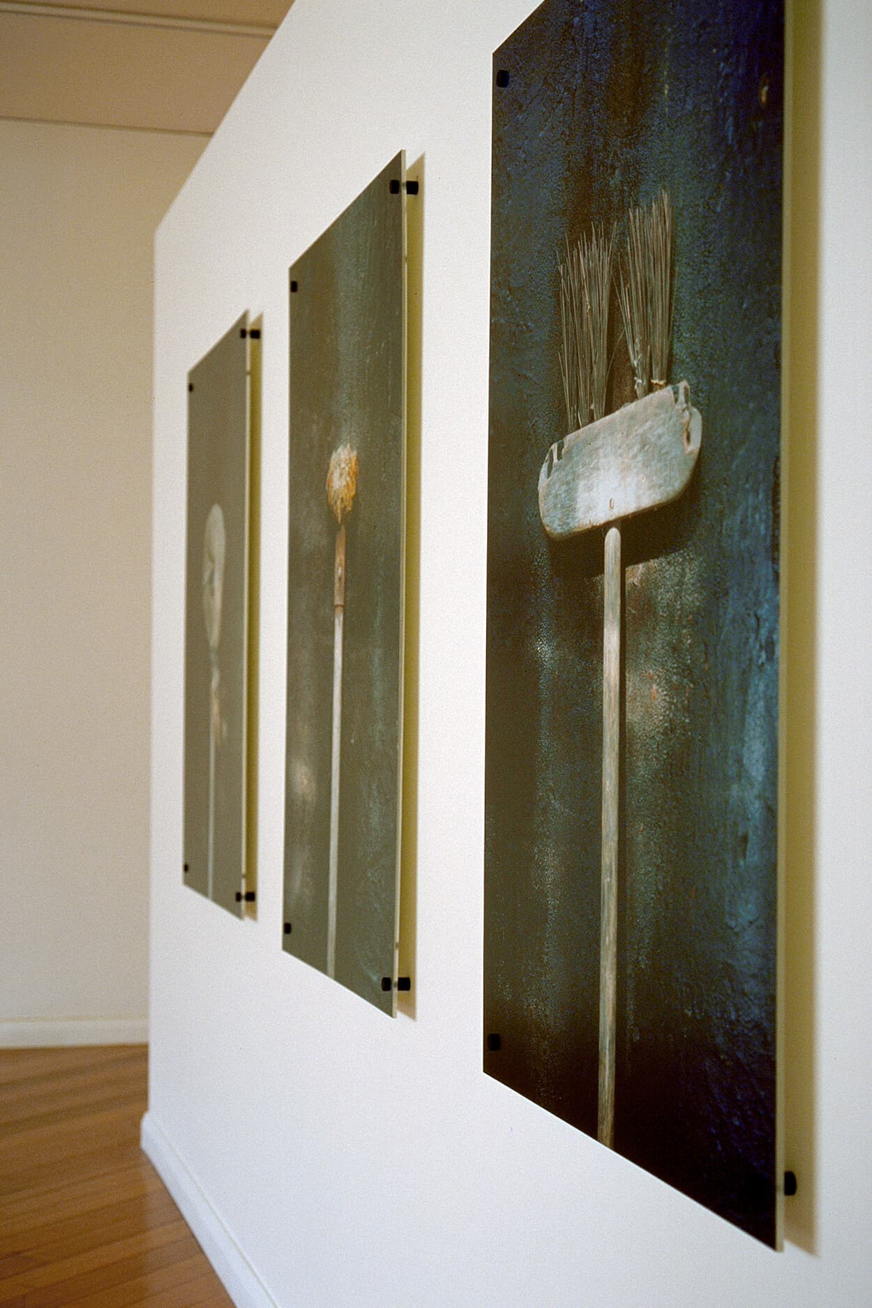 Installation view of Used-up Tool (brooms) series