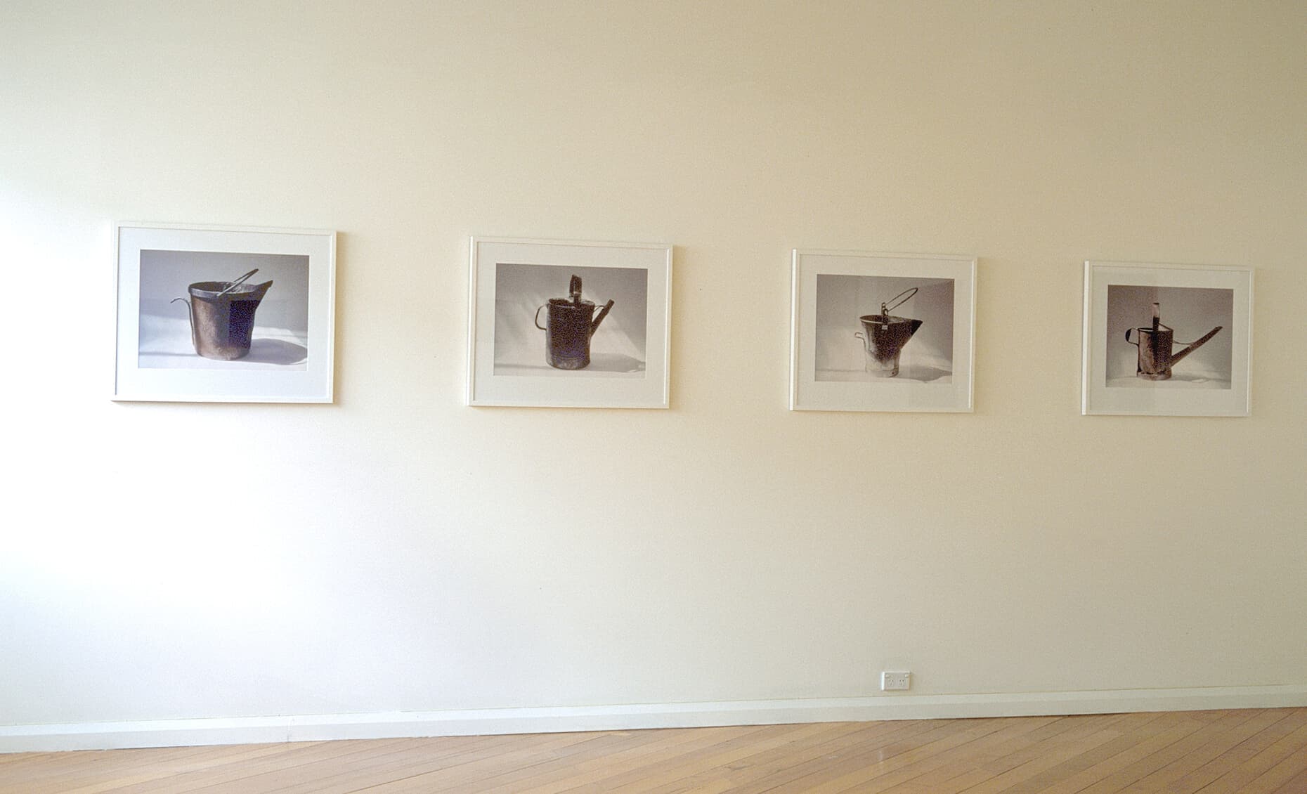 Installation view of Used-up Tool (pails and watering cans) series