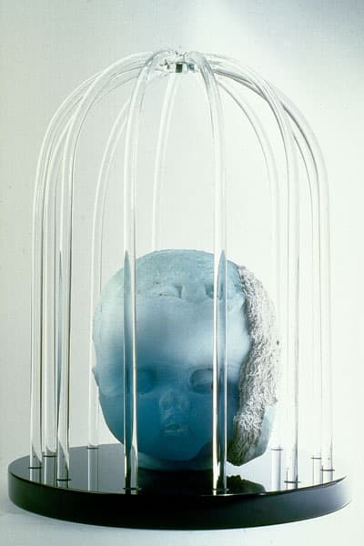 Untitled (head in cage)